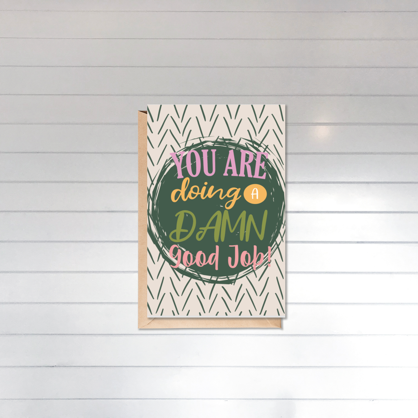 Motivational card with text 'You are doing a damn good job!' on a geometric patterned background