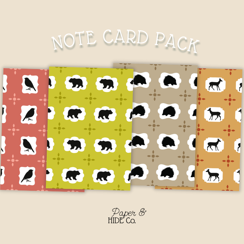 Note card pack with animal patterns on a beige background, featuring the brand 'Paper & Hide Co'.
