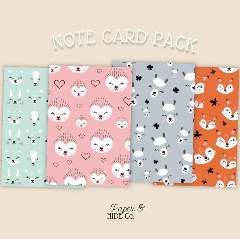 Note card pack with animal patterns on a beige background, featuring 'Paper & Hide Co'.