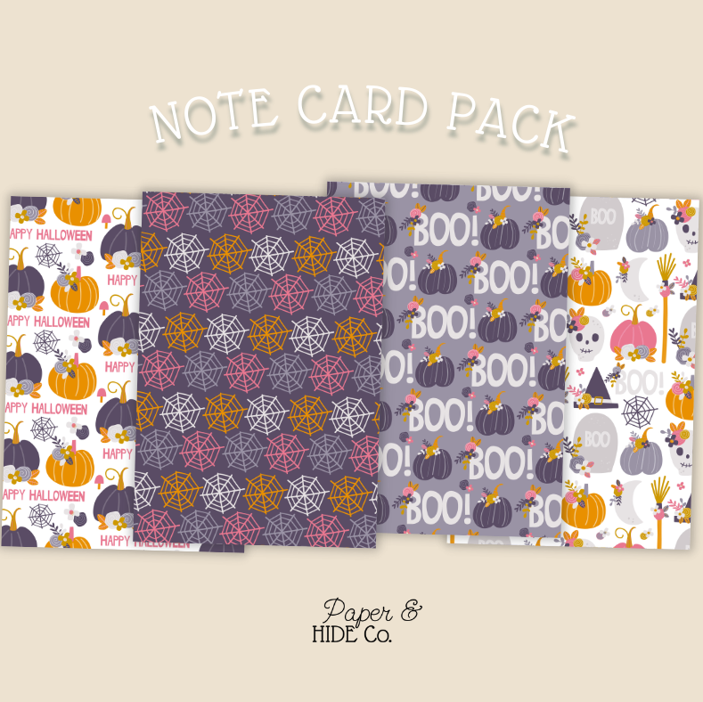 Set of Halloween-themed note cards with various designs on a beige background.