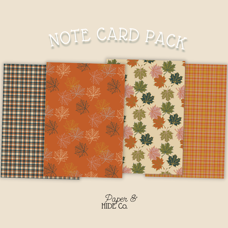 Note card pack with autumn-themed designs on a beige background, featuring the brand 'Paper & Hide Co'.