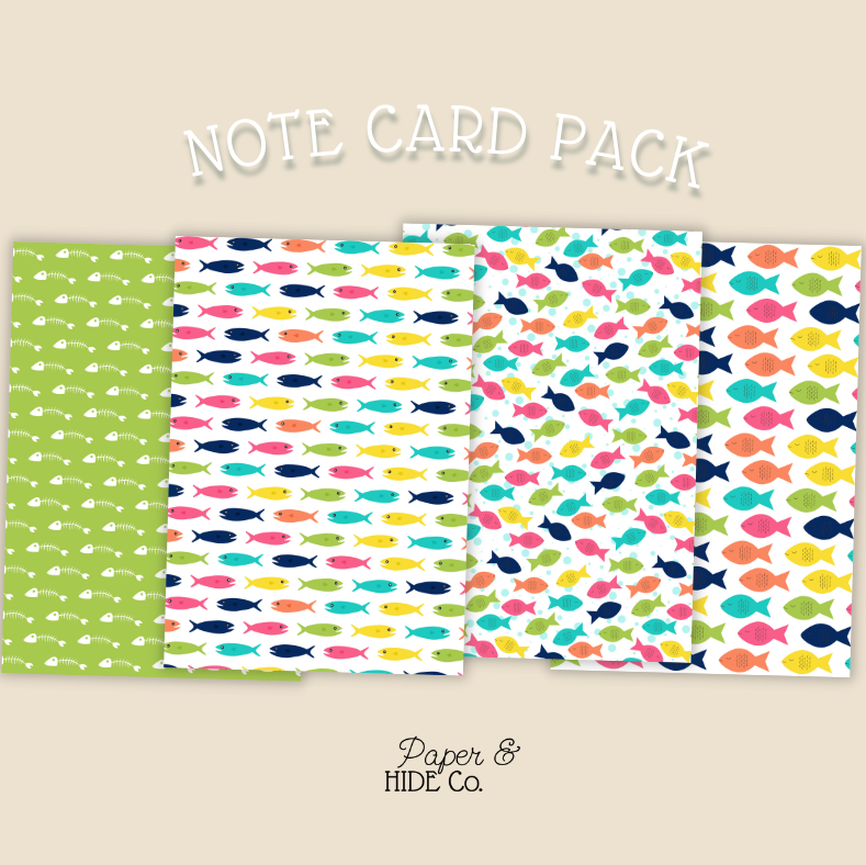 Note card pack with colorful fish patterns on a beige background, featuring the brand 'Paper & Hide Co'.