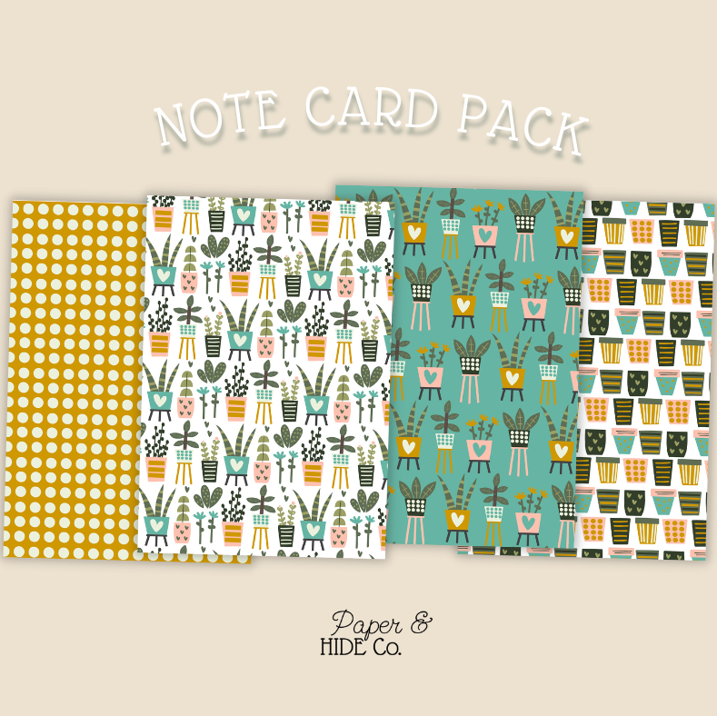 Note card pack with four different designs on a beige background, featuring the brand 'Paper & Hide Co'.