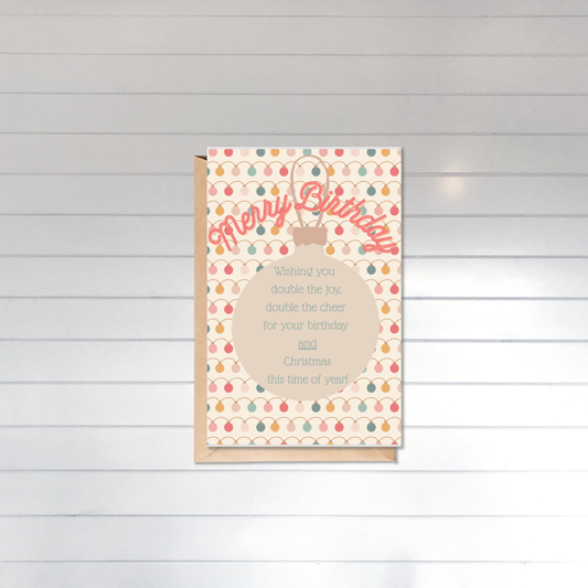 Birthday card with colorful design and text on a wooden surface