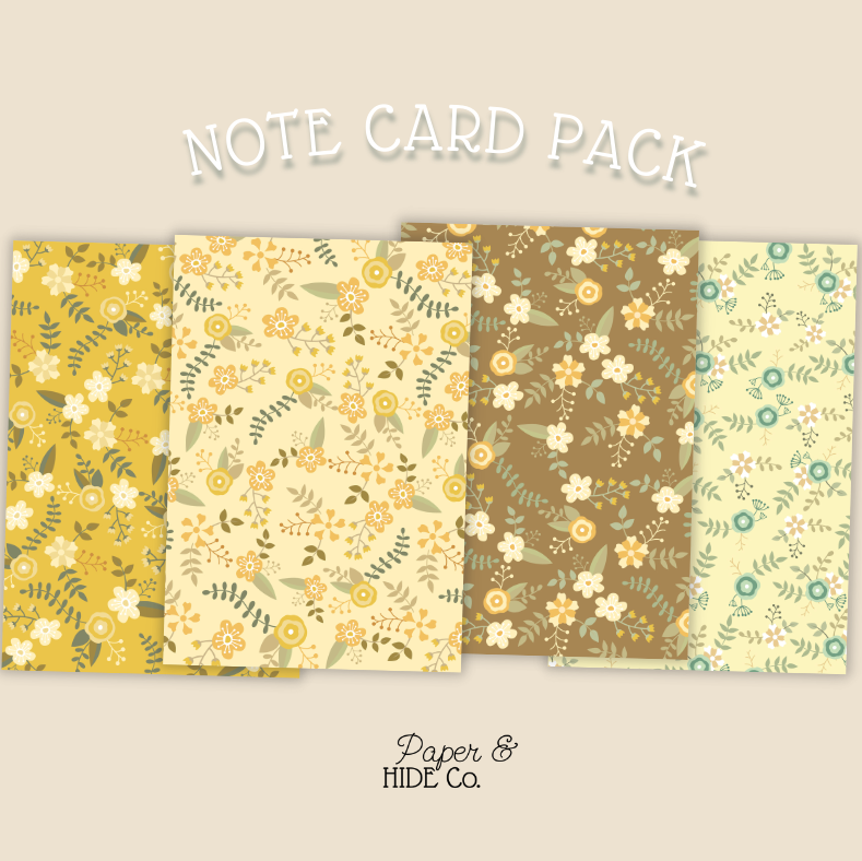 Note card pack with floral patterns on a beige background, featuring the brand 'Paper & Hide Co'.
