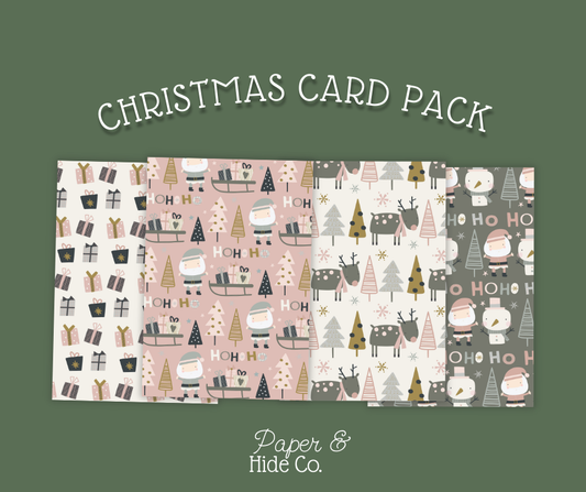 Christmas card pack with various patterns on a green background, featuring the brand 'Paper & Hide Co.'